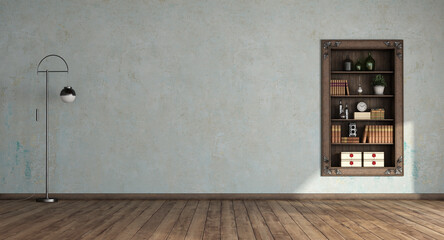 Empty old room with wooden bookcase in a niche