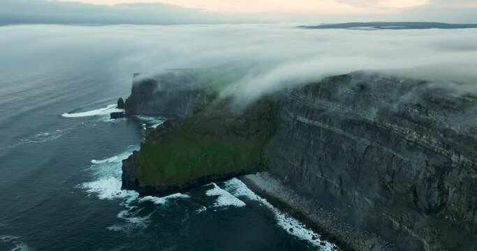 Clouds covered the top of the Cliffs of Moher 4k 