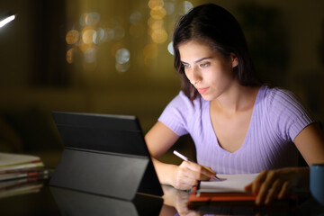 Student e-learning in the night using tablet
