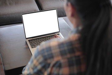 computer screen blank mockup.hand woman work using laptop with white background for advertising,contact business search information on desk at coffee shop.marketing and creative design