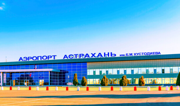 Astrakhan, Russia, September 23, 2023 view of the Astrakhan airport building, parking platform. On the building there is the inscription Astrakhan Airport named after B.M. Kustodieva, entrance.