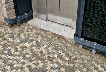 protection around the elevator with a sheet metal bumper. protects the door and lining from the...