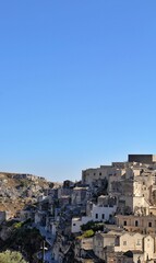 Fototapeta na wymiar view of the ancient city of Matera, old rock-cut houses, rock city in southern Italy, houses on the hill