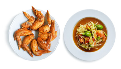 Fried chicken wings with papaya salad  Thai food in a plate PNG transparent
