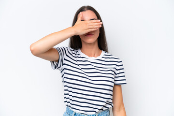 Young caucasian woman isolated on white background covering eyes by hands. Do not want to see something