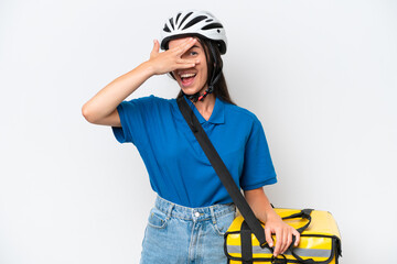 Young caucasian woman with thermal backpack isolated on white background covering eyes by hands and smiling