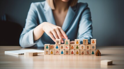 strategic businesswoman: planning with wooden blocks - action plan concept