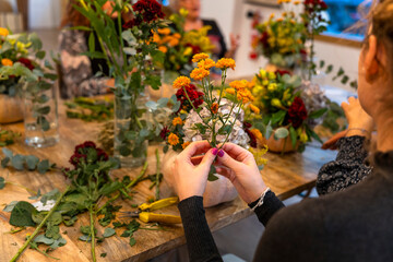 Natural flowers. Floral arrangement workshop with autumn flowers.