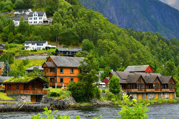 Fototapeta na wymiar The Eidfjord is the easternmost arm of the Hardangerfjord in the Fylke Vestland in Norway. The Eidfjord is a foothill to the east of the city of Bergen. 