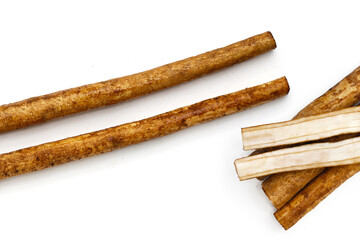 Burdock Root (Gobo) on white background.