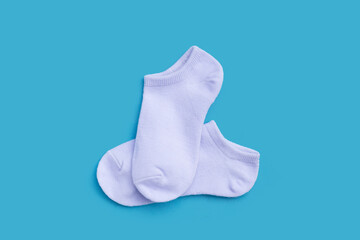 White socks on blue background.