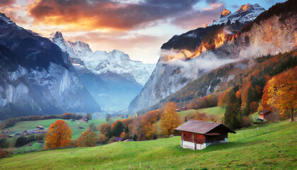 impressive outdoor scene of swiss alps bernese oberland in the canton of bern switzerland europe magnificent autumn sunrise in lauterbrunnen village beauty of countryside concept background - obrazy, fototapety, plakaty