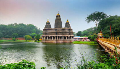 Fototapeta na wymiar big indian temple near lake generate ai