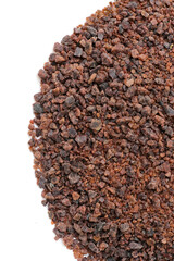 Black himalayan salt on white background.