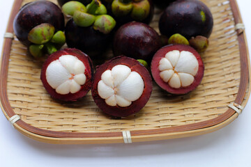 Fresh mangosteen fruit on white background.