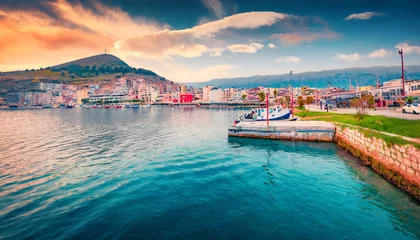 Foto op Canvas fantastic spring cityscape of saranda port captivating ioninian seascape wonderful evening scene of albania europe traveling concept background © Nichole