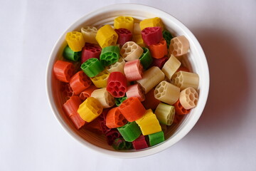 Raw fryums snack. Its other names Far far.  It's deep fried, and they are either eaten as a snack or served like a papadum to accompany a meal. Indian snack composed primarily of potato starch, sago.