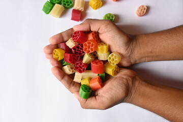 Raw fryums snack. Its other names Far far.  It's deep fried, and they are either eaten as a snack or served like a papadum to accompany a meal. Indian snack composed primarily of potato starch, sago.