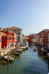 Chioggia town in venetian lagoon, water canal and church. Veneto, Italy, Europe