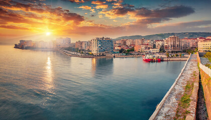 impressive sunrise in durres port city on the adriatic sea in western albania europe wonderful adriatic seascape magnificent spring scene of albania traveling concept background - obrazy, fototapety, plakaty
