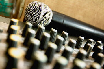 A wireless microphone is placed in the control room and records sound.