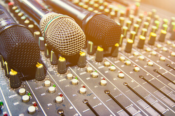 Wireless microphone is placed in the control room and records sound.