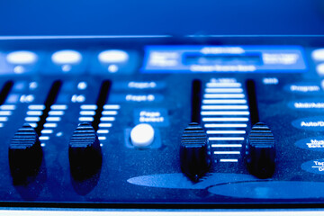 Slide volume mixer in a professional recording studio.
