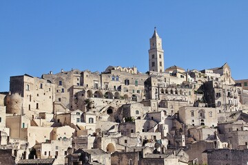view of the ancient city of Matera, old rock-cut houses, rock city in southern Italy, houses on the hill