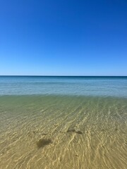 Transparent blue sea water, blue sea horizon, pure sky, natural blue seascape background