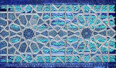 Geometric traditional Islamic ornament. Fragment of a ceramic mosaic. Abstract background.