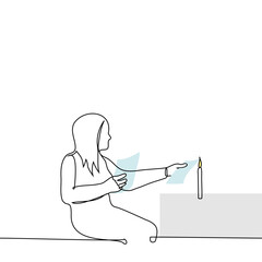 woman sitting burning paper sheets from a burning candle - one line art vector. concept burn letters or incriminating documents