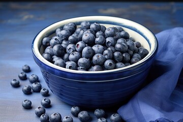 freshly washed blueberries in a blue bowl