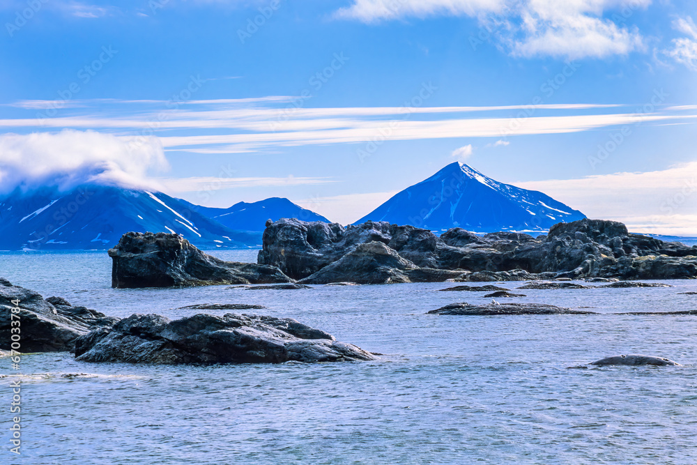 Poster Rocks in the sea at Svalbard coast