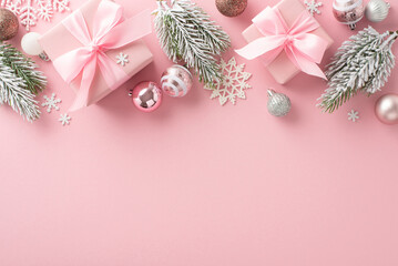Elegant Festive Display. Top-view shot of presents with bows, adorable tree baubles, snowflake...