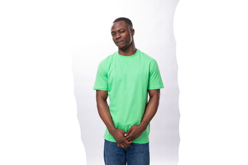 Fototapeta premium young lucky 30 year old american guy dressed casual holding new credit card with mockup