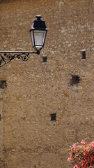 Fototapeta na wymiar A lamp at the Place de la Conception in Menton at the Côte d'Azur in France, in the month of June