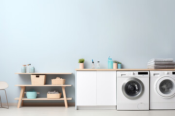 washing machines in a clean organized neat utility laundry room or washing service room interior front view shot as wide banner mockup design with copy space area - obrazy, fototapety, plakaty