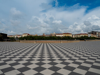 Terrazza Mascagni in Livorno under a blue sky with scattered clouds