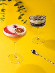 Coffee cocktail with cream and coffee beans and tropical cocktail