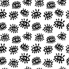 Brush drawn eyes seamless vector pattern. Open black eyes hand-drawn with bold lines. Seamless pattern in simple grunge style . Monochrome fashion design.