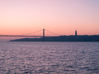 The 25 de Abril bridge at sunrise 2