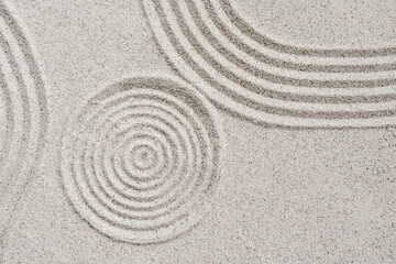 Fototapeta na wymiar Zen garden Japanese top view, Circle round sand background, Meditation of Buddhism 