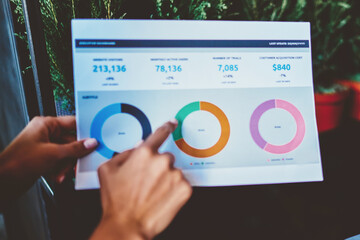 Cropped view of paper report with diagram statistics of informational data