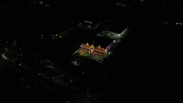 Aerial view of a temple stage setup for Ganesh Chaturthi and cultural activities