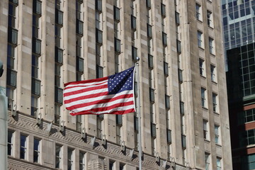 american flag on the building