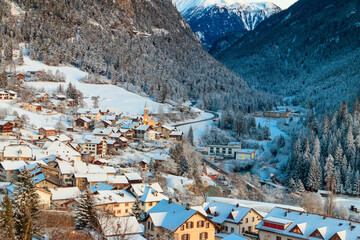 Fototapeta na wymiar Winter view of small town Filisur in Switzerland at evening