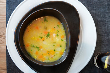 Close up Zuppa d'orzo e speck, Ricetta Altoatesina (Italian beans and barley soup)