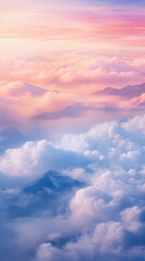 Cloudscape over mountain peaks at dawn. Clouds in pink and blue shades.