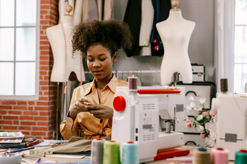 Fashion designer woman works at tailor shop. Fashion Design Mannequin Measurement Concept.