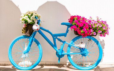 Charming bar and street decoration design in retro style with old bicycle and flowers. Floral bike decor.